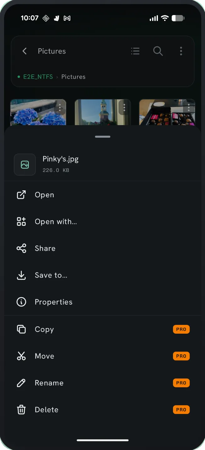 Sharing a file from a USB drive to another Android app via the system share sheet.